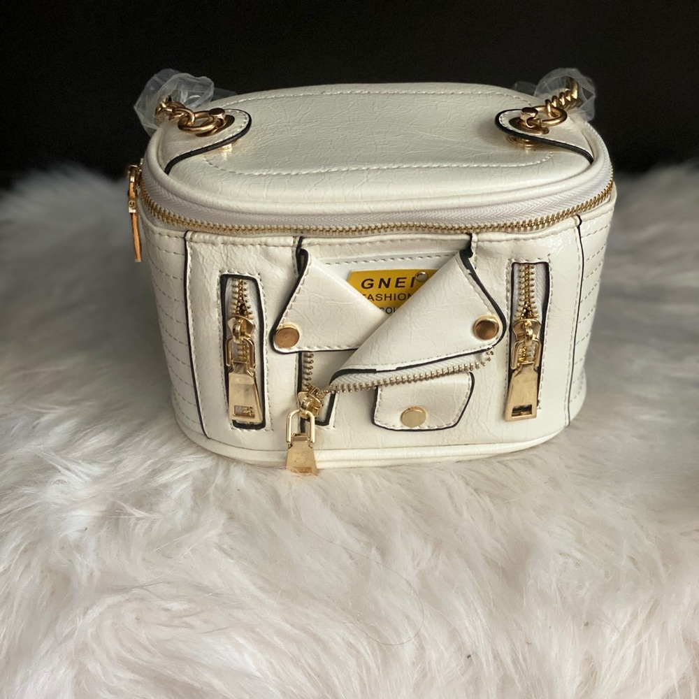 Love X. Clusively Handbag